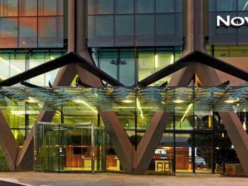 a building with a noc sign in front of it at Novotel Auckland Airport in Auckland