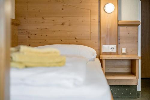 Postel nebo postele na pokoji v ubytování Pension Almrausch
