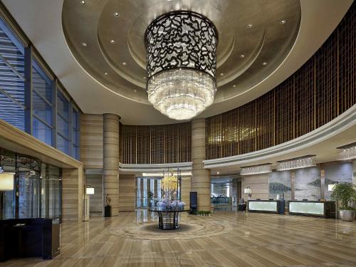 Ο χώρος του λόμπι ή της ρεσεψιόν στο Pullman Wuxi New Lake