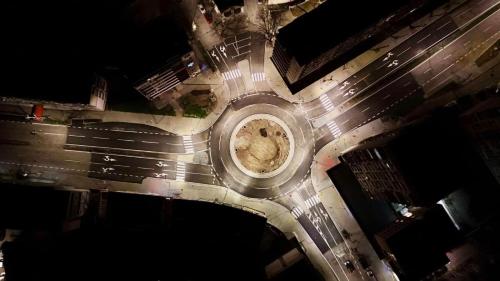 an aerial view of a busy city street at night at Апартамент с една спалня в ценъра на града in Yambol