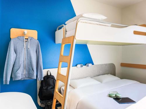 Katil atau katil-katil dalam bilik di Ibis budget Lausanne-Bussigny