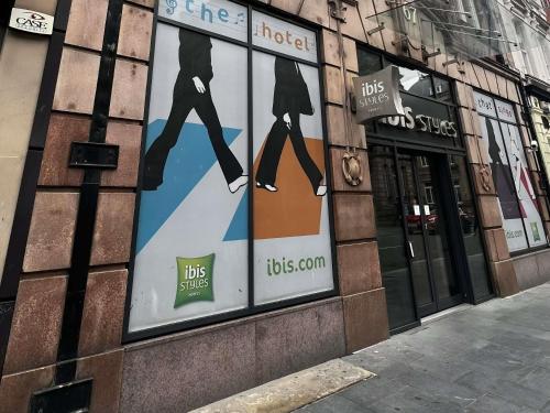 a building with posters on the side of it at Ibis Styles Liverpool Centre Dale Street - Cavern Quarter in Liverpool