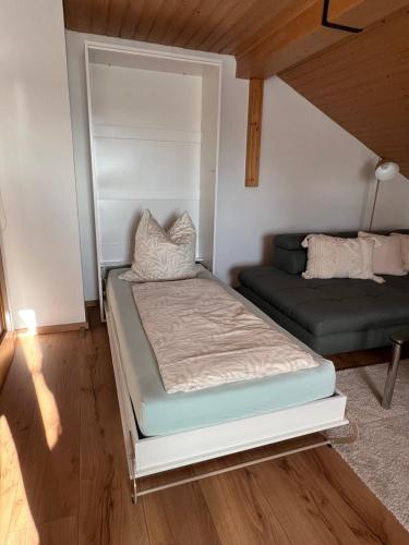 Un ou plusieurs lits dans un hébergement de l'établissement Home Sweet Home - Gemütliche Ferienwohnung