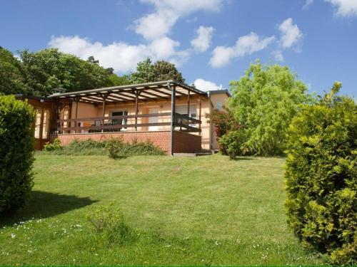 a house with a large lawn in front of it at Hideaway Near Castle Views in Blankenburg