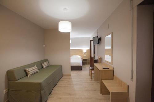 Una cama o camas en una habitación de Hotel Meve