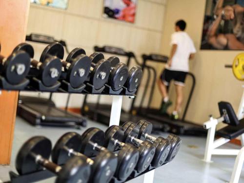 O centro de fitness e/ou as comodidades de fitness de Pullman Zhangjiajie Hotel - Instagrammable