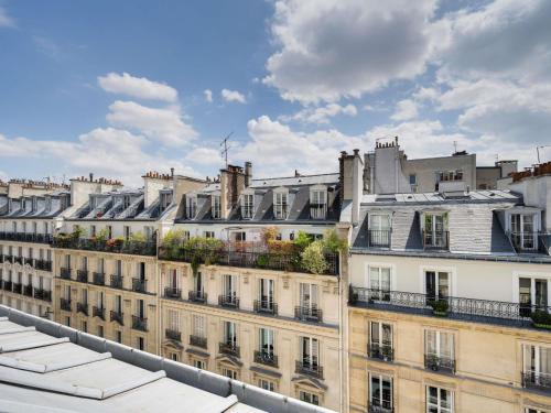 a group of buildings with plants on the roofs at ibis Styles Paris Cadet Lafayette in Paris