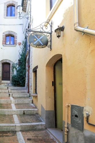 a building with a sign on the side of it at Residenza Sant'Andrea in Campobasso