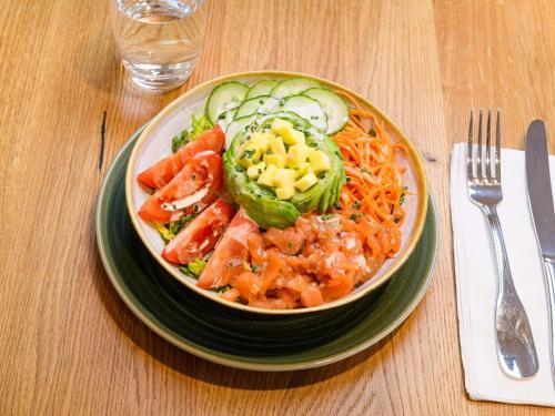 a bowl of food on a plate on a table at ibis Styles Tours Centre in Tours