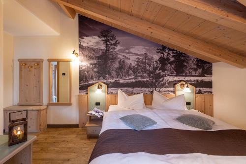 Ένα ή περισσότερα κρεβάτια σε δωμάτιο στο Hotel Daniela