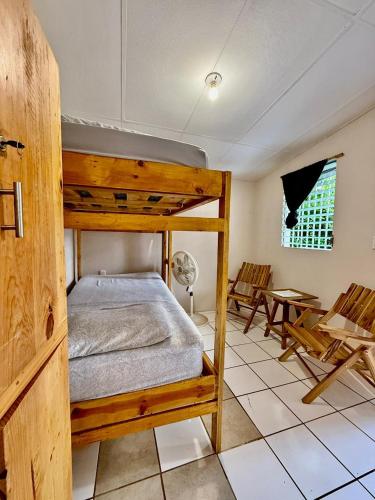 Llit o llits en una habitació de Hostal Namborus