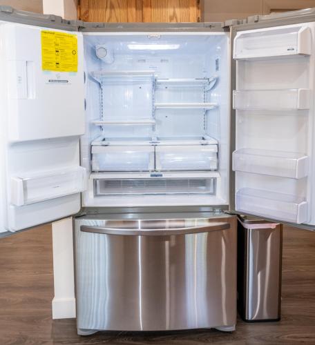 an empty refrigerator with its door open in a kitchen at Remodeled Family Retreat 15ppl in Page