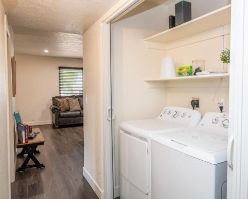 a laundry room with a washer and dryer at Remodeled Family Retreat 15ppl in Page