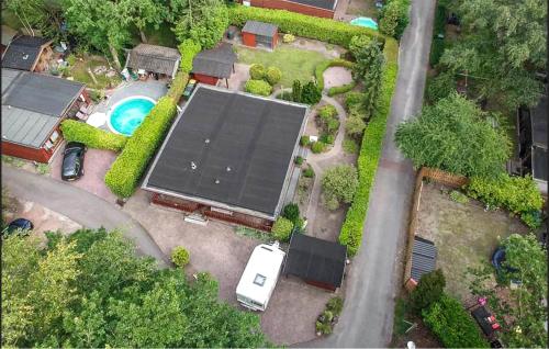an aerial view of a house with a large solar panel at Stunning Home In Erm With Sauna in Erm