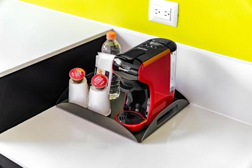 a sewing machine in a drawer in a room at Holiday Inn Express & Suites Puebla Angelopolis by IHG in Puebla