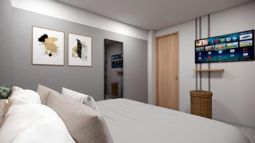 Katil atau katil-katil dalam bilik di Miami Hotel Cartagena - Luxury Apartments