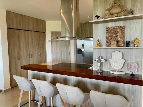 Imagen de la galería de Golf Course Ocean View Penthouse Reserva Conchal, en Brasilito