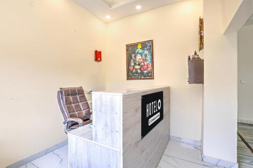 Χώρος καθιστικού στο Super Hotel O Clock Tower Dehradun Formerly Dooncity Suites