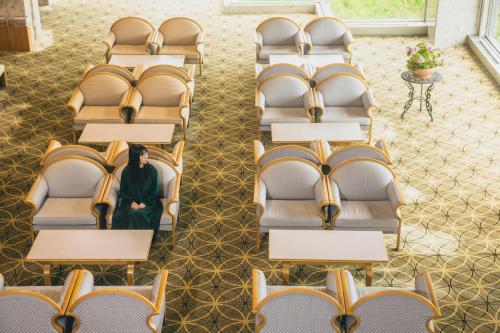 an overhead view of empty seats on an airplane at Oehonke in Kitami