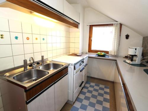 Cuisine ou kitchenette dans l'établissement Chalet Westermeyr