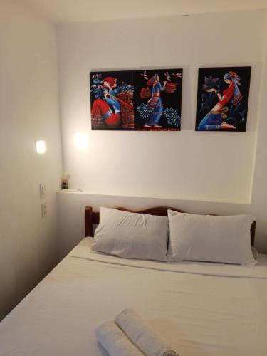 Postel nebo postele na pokoji v ubytování Gaja Go Dive and Inn