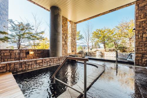 a pool of water inside of a building at Oehonke in Kitami