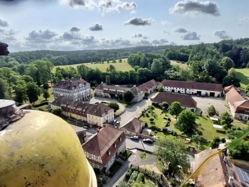 an aerial view of a town with a large gold ball at Holiday home with 4 bedrooms in Maroldsweisach