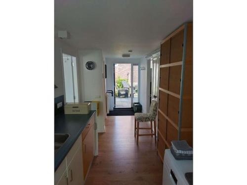 Kuchyň nebo kuchyňský kout v ubytování Centraal aan Zee