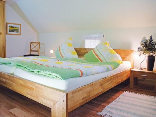 Ένα ή περισσότερα κρεβάτια σε δωμάτιο στο Holiday apartment Zum Torfstecher