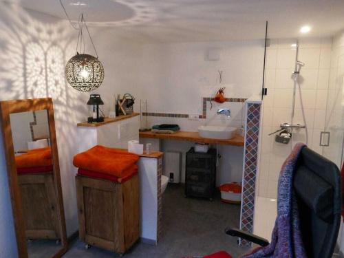 a kitchen with a sink and a counter in a room at Holiday apartment with 2 bedrooms in Hohenfelde