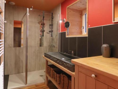 a bathroom with a shower and a sink at Maison isolée avec spa nordique, piscine et jardin privatif au cœur de la nature - FR-1-497-116 in La Lande-de-Goult