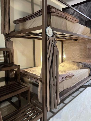 Katil atau katil-katil dalam bilik di Chato Hostel