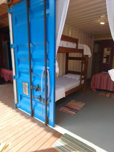 Postel nebo postele na pokoji v ubytování A Casa Raiz Containers
