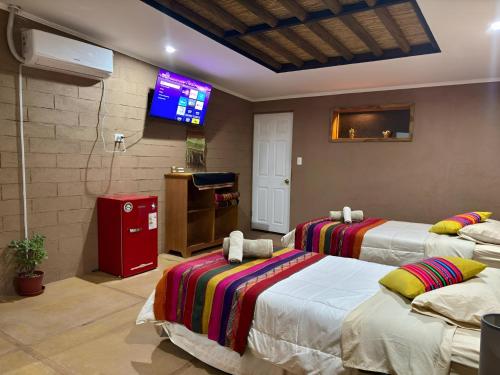 Ένα ή περισσότερα κρεβάτια σε δωμάτιο στο Tiunur Lodge