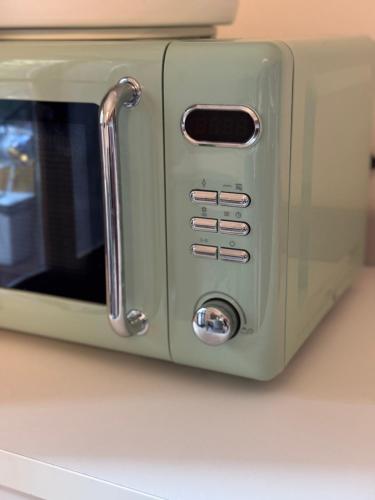 a close up of a toaster oven on a counter at Il cuore della valtellina in Caiolo