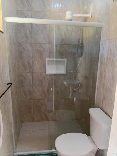 a bathroom with a shower with a toilet at Pousada Araújo em Paraty 1 in Paraty