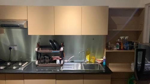 Una cocina o cocineta en Luxe Apartments