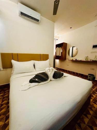 Letto o letti in una camera di KANBULO House Maldives