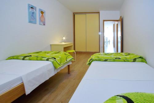 Postel nebo postele na pokoji v ubytování Luxury Apartments SIKIRIC with Fantastic View on the sea