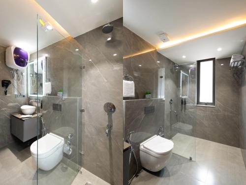 a bathroom with a toilet and a shower at Saltstayz Premier - Naraina, Central Delhi in New Delhi