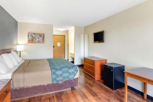 Ένα ή περισσότερα κρεβάτια σε δωμάτιο στο Econo Lodge Longmont East