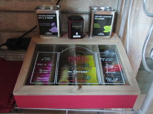 a display of books in a display case at Le relais des deux tours in Brémondans