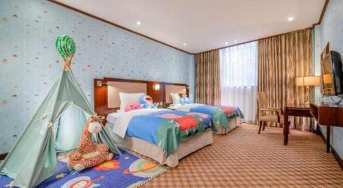 Cama o camas de una habitación en Nanning Yongjiang Hotel