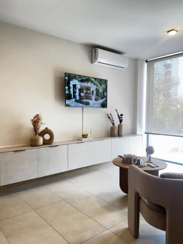 Μια τηλεόραση ή/και κέντρο ψυχαγωγίας στο Loft Americana Chapultepec Alberca Wifi AC