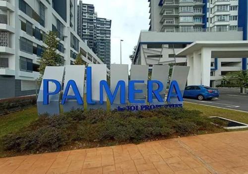 a sign for palmera in front of a building at Palmera Residensi in Kajang