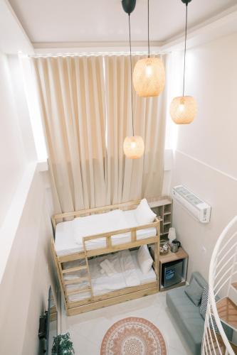 Palms La Union Beachfront Suitesにあるベッド