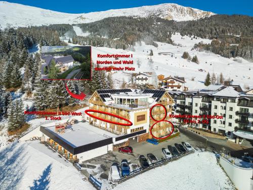 an aerial view of a ski resort in the snow at Natürlich Hotel mit Charakter in Fiss