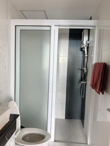 a bathroom with a shower and a toilet at SHaCk Place 87 in Ban Puk (2)