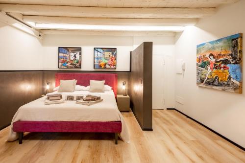 Ένα ή περισσότερα κρεβάτια σε δωμάτιο στο Stelle di Verona - Polaris