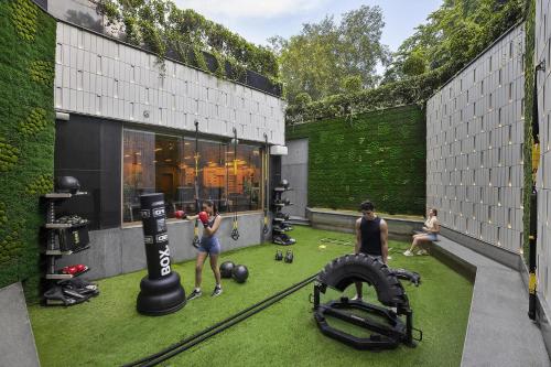 a group of people working out in a gym at Shangri-La Eros New Delhi in New Delhi